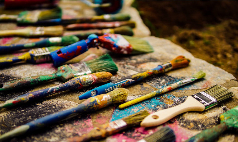an image showing paint brushes meaning modern art, 